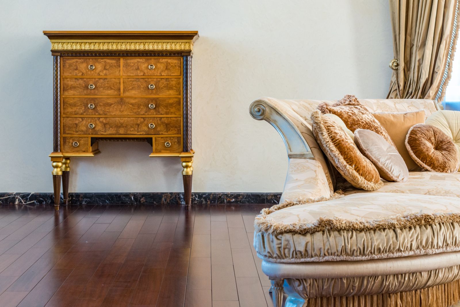 A study with antique furniture, leather-bound books, and personal effects